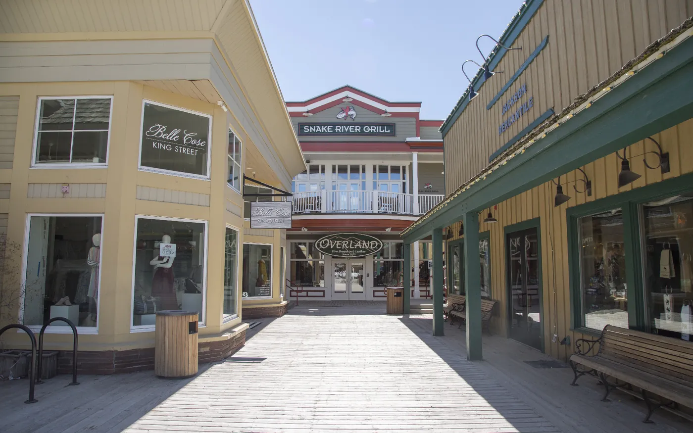 Downtown Jackson boardwalk and storefronts on a sunny day